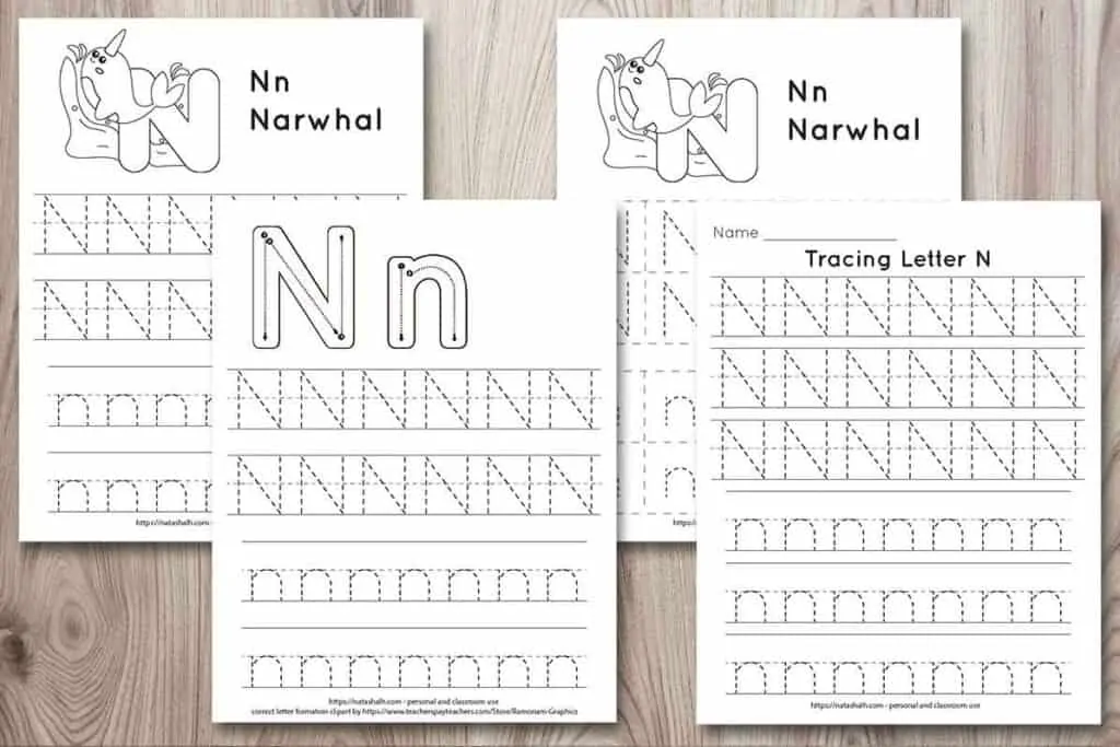 Four printable letter n tracing pages on a wood background. All feature uppercase and lowercase letter n's to trace in a dotted font. Two have a narwhal to color and one page has correct letter formation graphics for uppercase and lowercase n's. The last page is all lined tracing practice with no additional graphics.