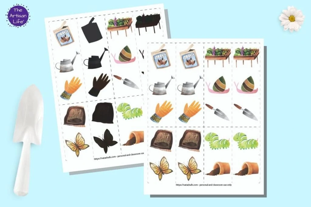 A preview of two free printable garden matching game pages. Each page has pairs of 10 garden related images inside dotted squares to cut out and use as a matching card game. The page in back has half of the images in color and the other half "blacked out" for a shadow matching game. The two printables are on a blue background with a white trowel and a white daisy flower.