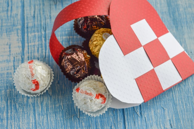 red and white woven heart basket