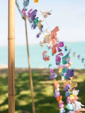 DIY wedding arch with paper flower lei garland