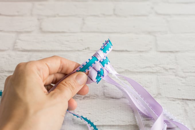 braiding the tricolor ribbon lei