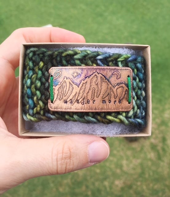 knitted bracelet with copper etched mountains