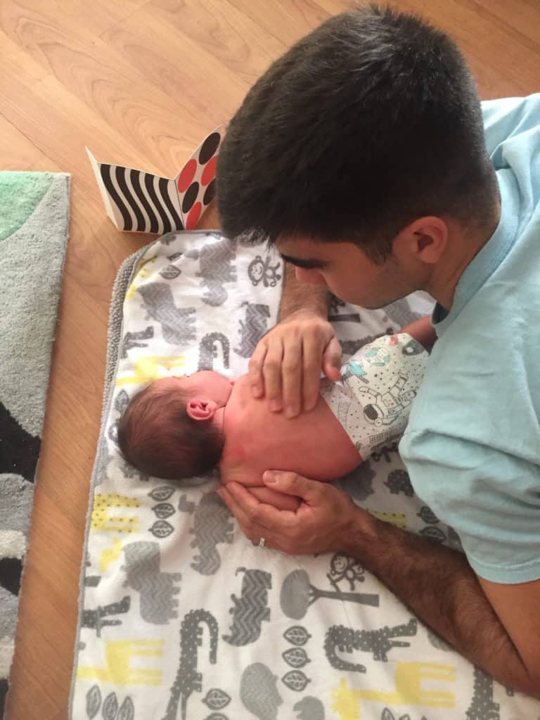 tummy time with a newborn and high contrast cards