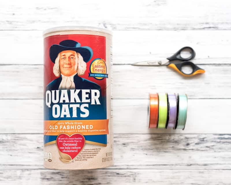 materials for DIY fine motor toy with an oatmeal box
