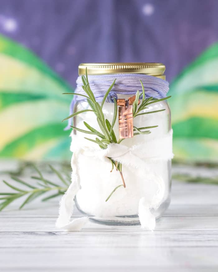 foot soak for sore feet with rosemary and magnesium flakes