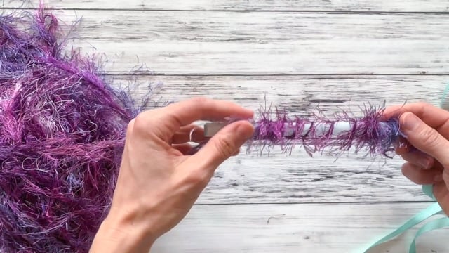 wrap eyelash yarn around single straw