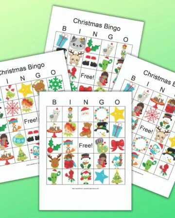 four free printable Christmas picture bingo cards with secular cartoon Christmas images on a green background