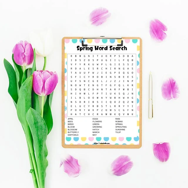 free printable spring word search on a clipboard. The cupboard is on a white background with tulips 
