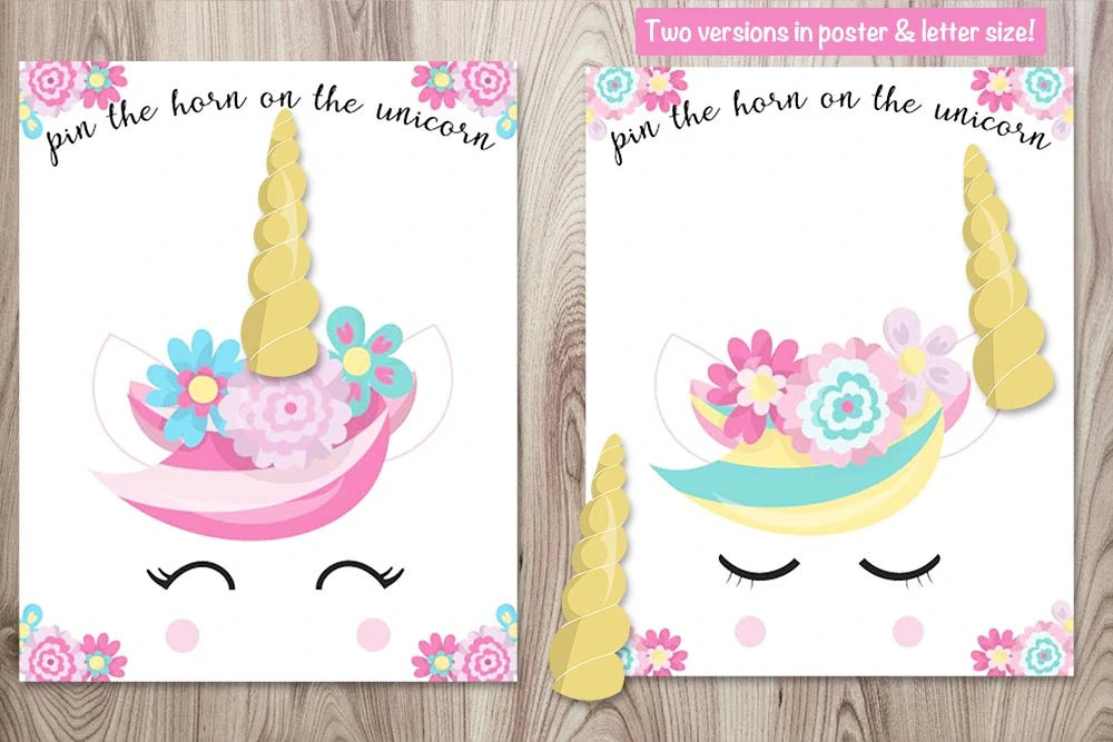 Two printable pin the horn on the unicorn posters with three horns on a wood background