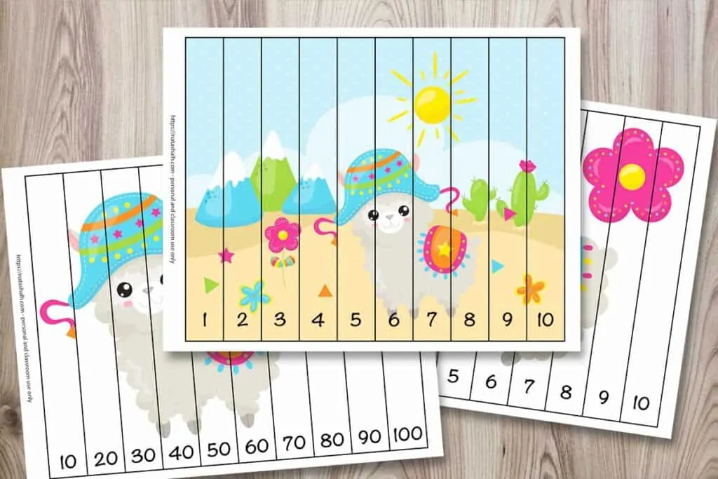 Three llama themed number building puzzles for children. The front image is a full color scene with a cartoon llama in the dessert with mountains and cacti. It has strips to cut with numbers 1-10. Two other puzzles are partially visible. One has a llama and numbers 10-100 by 10s. The back image has a llama and a flower and features the numbers 1-10.