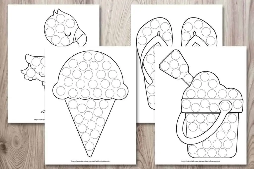 Four free printable dab a dot worksheets on a wood background. Each worksheet has a summer themed image with round black and white circles to dot in with a bingo dauber marker. One image is a sand bucket with shovel, one is an ice cream cone, one is a flamingo, and one is a pair of sandals. 