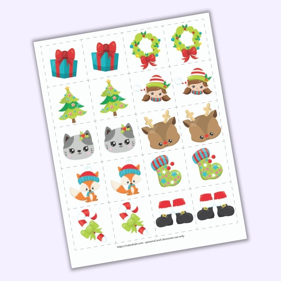 A preview of a Christmas themed matching game for toddlers and preschoolers. There is a grid of 8 pairs of images on 2" cards to cut out. Images include a present, a Christmas tree, a cat face, a fox wearing a hat, a candy cane with a green bow, a wreath, a girl elf face, a Rudolph face, a green Christmas stocking, and Santa boots.