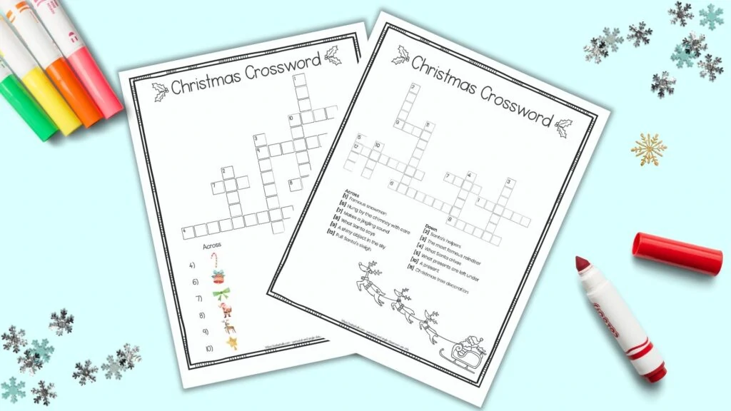 Two free printable Christmas crossword puzzles for children with a doodle frame border and black and white image of Santa with his sleigh. One puzzle has picture clues for young children and the other has text clues for elementary students. The puzzles are on a blue background surrounded by children's markers and snowflake shaped confetti. 