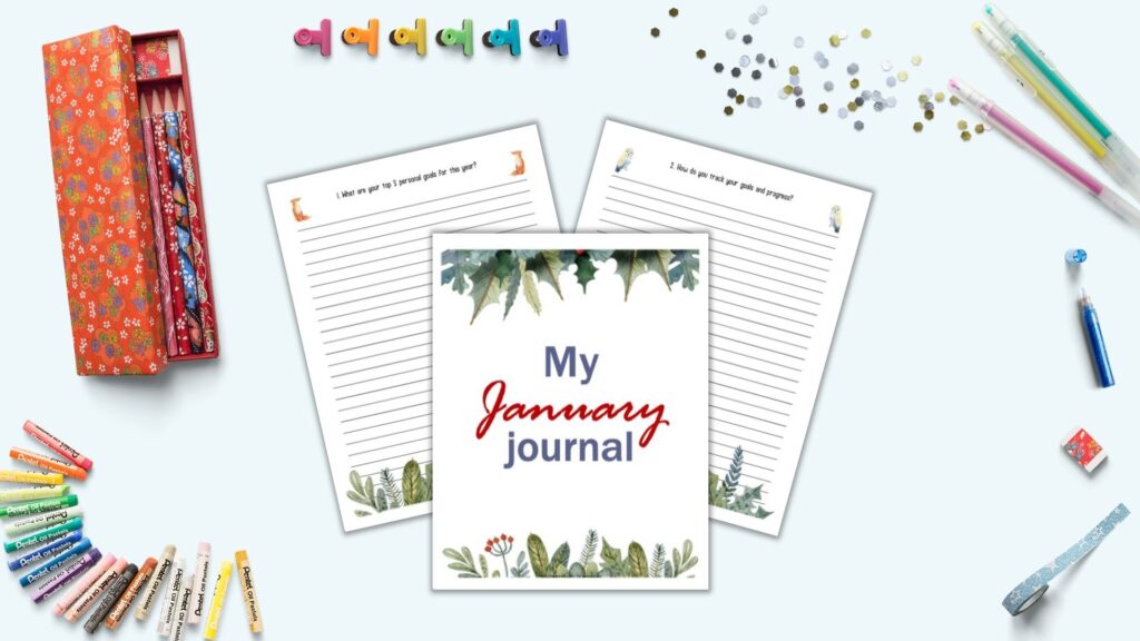 a flatly mockup of a desk with three printables. The printables are "My January Journal" and two lined journal pages. The printables have watercolor winter greenery illustrations and are on a light blue surface surrounded by desk supplies including gel pens, colorful binder clips, oil pastel crayons, and confetti.