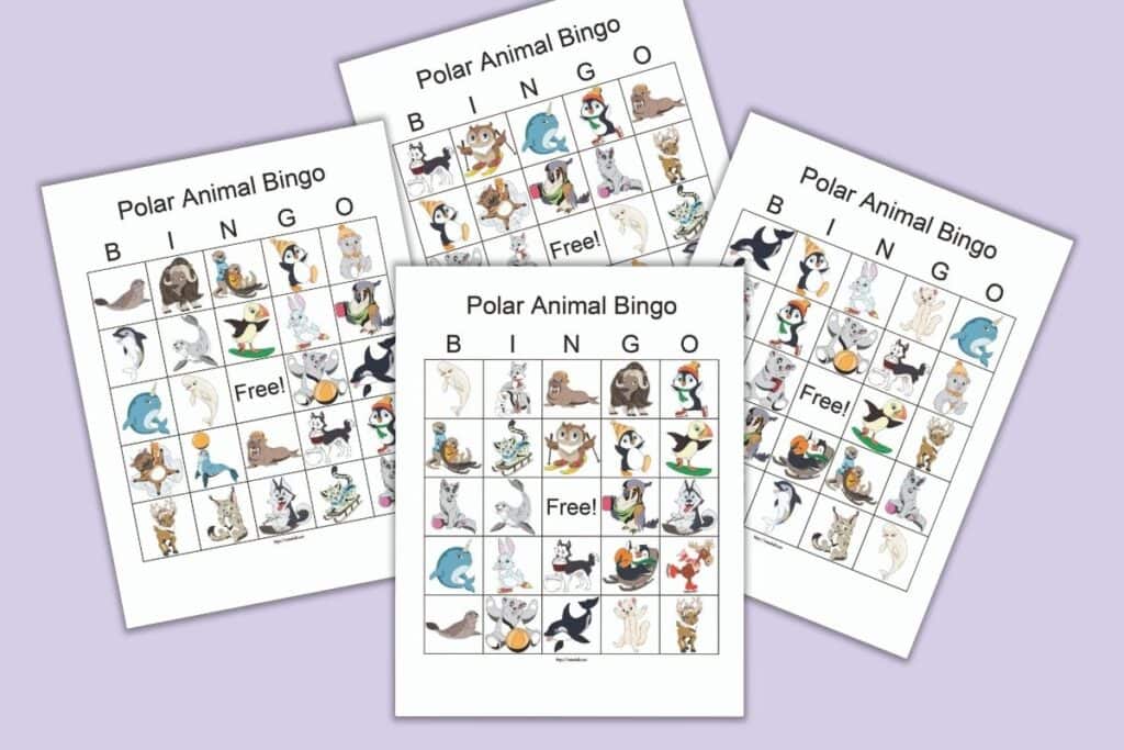 Four free printable polar animal bingo cards on a purple background. Each card has 24 cartoon polar animals and a central free space. 