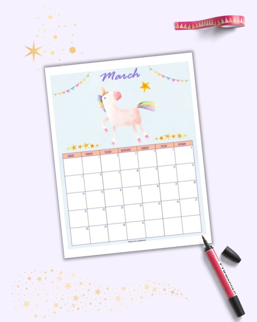 A flatlay of a March calendar page for 2021 with watercolor unicorn graphics. The page is on a purple surface with a hot pink marker and bright pink washi tape.