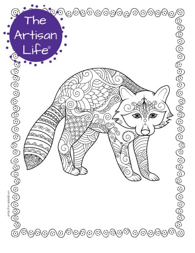 A preview of a raccoon coloring page for adults. The raccoon has hand drawn doodles to color and the page is bordered by a doodle frame. A purple round logo reading "the artisan life®" is in the corner.