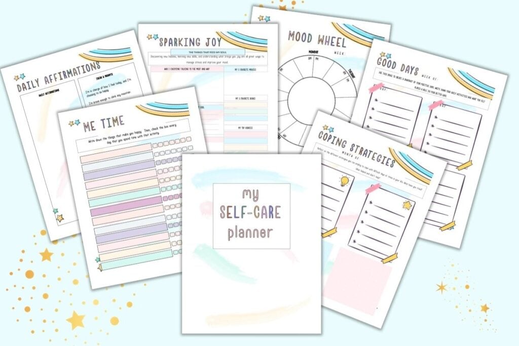 A flatlay preview of a printable self-care planner with cheerful rainbow colors. Pages shown include a cover page, "me time," daily affirmations, coping strategies, "good days," mood wheel, and "sparking joy"