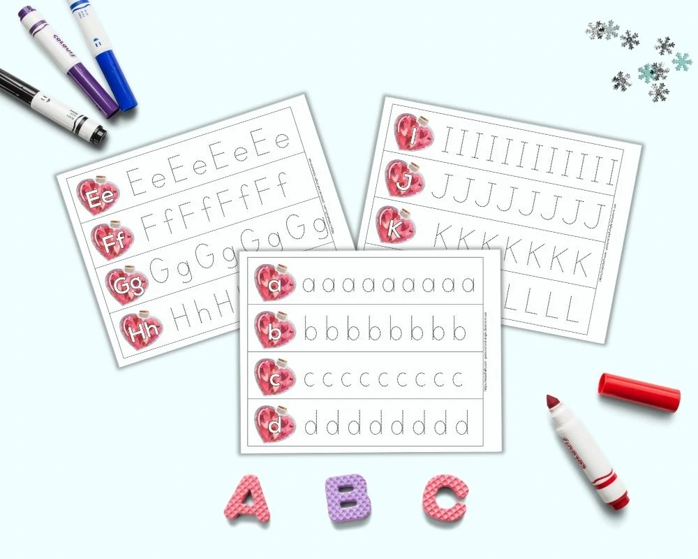 An image with three tracing strip page printables. Each page has four letters on a bottle filled with hearts. One letter is on each bottle. Next to the bottle is a row of the same letter to trace in a dotted font. Around the pages are foam letters a, b, and c as well as brightly colored children's markers.