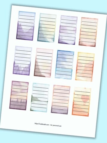 A preview of a page of 12 full box planner stickers for Happy Planner Classic. Each box has a watercolor landscape background and a translucent white rectangle with seven lines to write on.