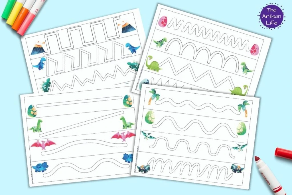 A flatlay preview of four printable dinosaur trace in the path prewriting pages. Each page has four paths to trace to built prewriting skills. There is a dinosaur related clipart image at the beginning and end of each path. The pages are on a blue surface with colorful children's markers. 
