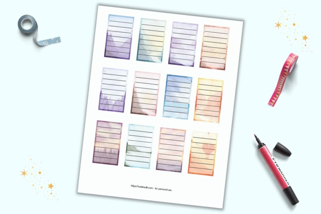 A preview of a page of 12 full box planner stickers for Happy Planner Classic. Each box has a watercolor landscape background and a translucent white rectangle with seven lines to write on. There are two rolls of washi tape and an open red marker beside the page.