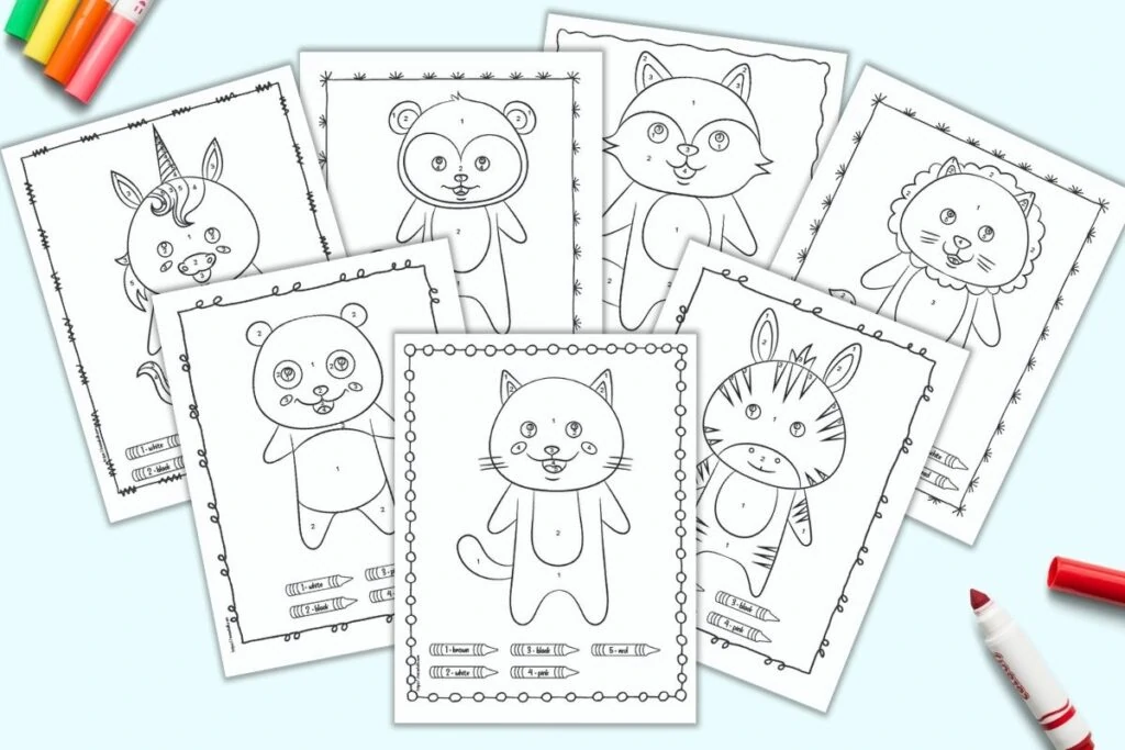 A preview of seven printable color by number animal pages for children. Easy color by number animals include: cat, zebra, panda, unicorn, bear, fox, and lion. The pages are on a light blue background with colorful children's markers. 