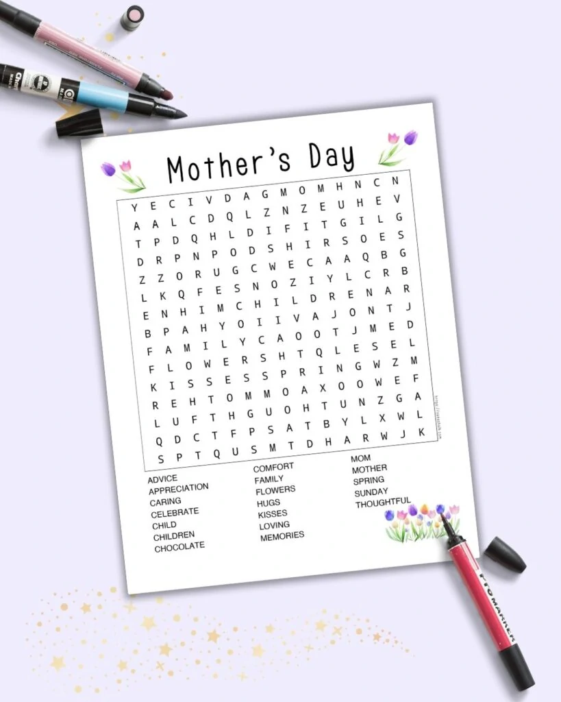 A flatlay mockup of a printable Mother's Day word search on a light purple background with a pink, red, and a blue marker.