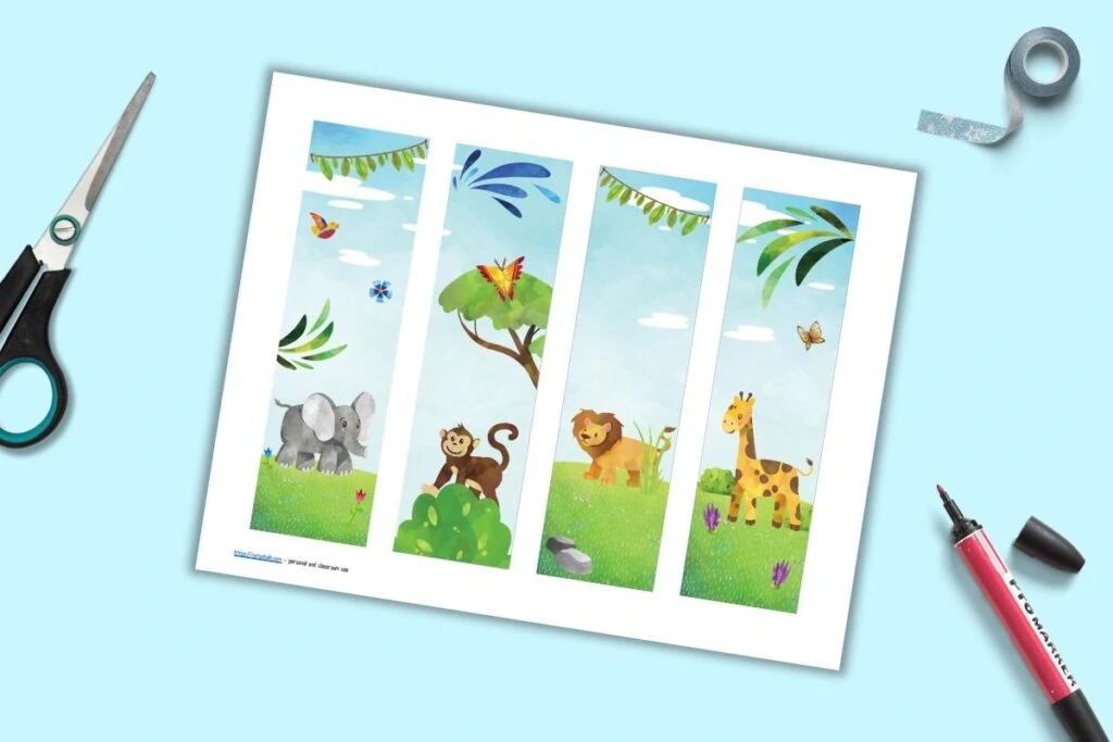 Four printable bookmarks on one printed page. Each bookmark has an African safari animal - an elephant, a monkey, a lion, and a giraffe. The page is on a blue background. 