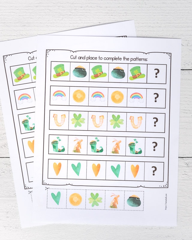 Two printed pages of cut and paste complete the pattern worksheets for preschoolers. Each page has five patterns made with St. Patrick's Day clipart to complete. There are five tiles to cut out to complete each pattern with.