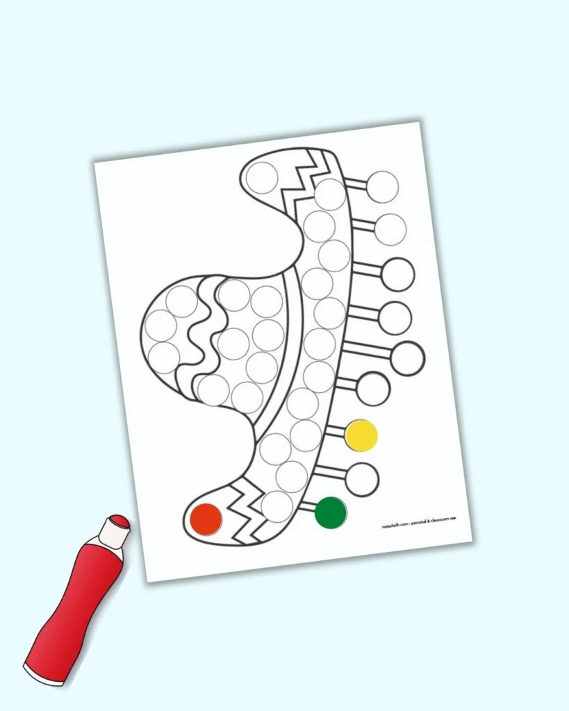 A Mexican sombrero dot marker coloring page with a red, green, and yellow dot next to an illustrated red dauber marker.