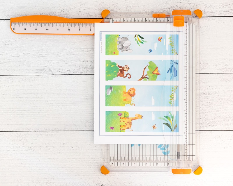 A printable page with four bookmarks on a paper cutter.