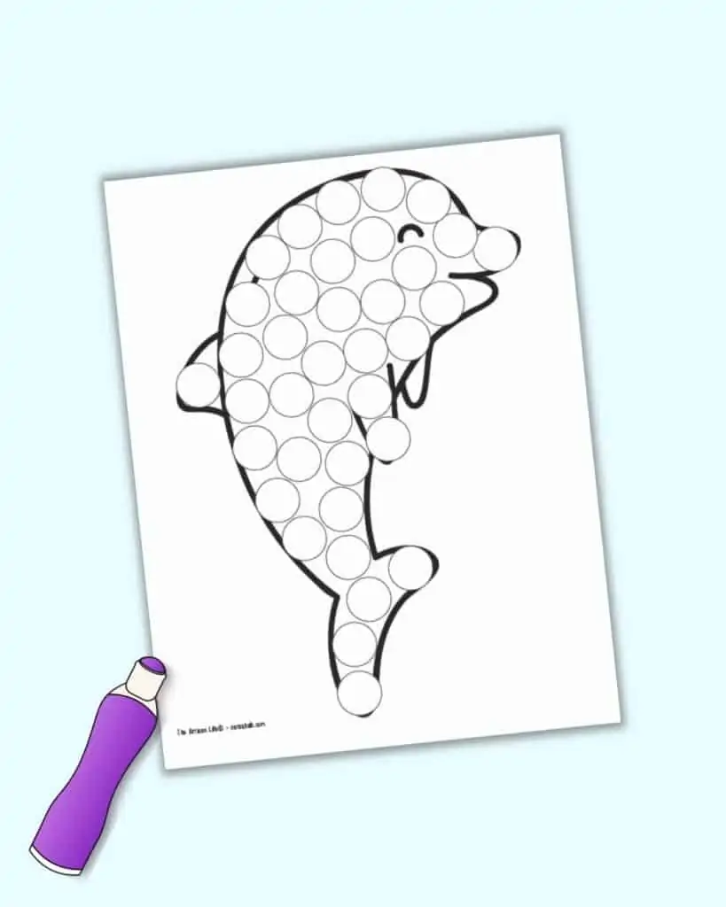 A preview of a free printable dolphin dot marker coloring page with an illustrated purple dauber marker