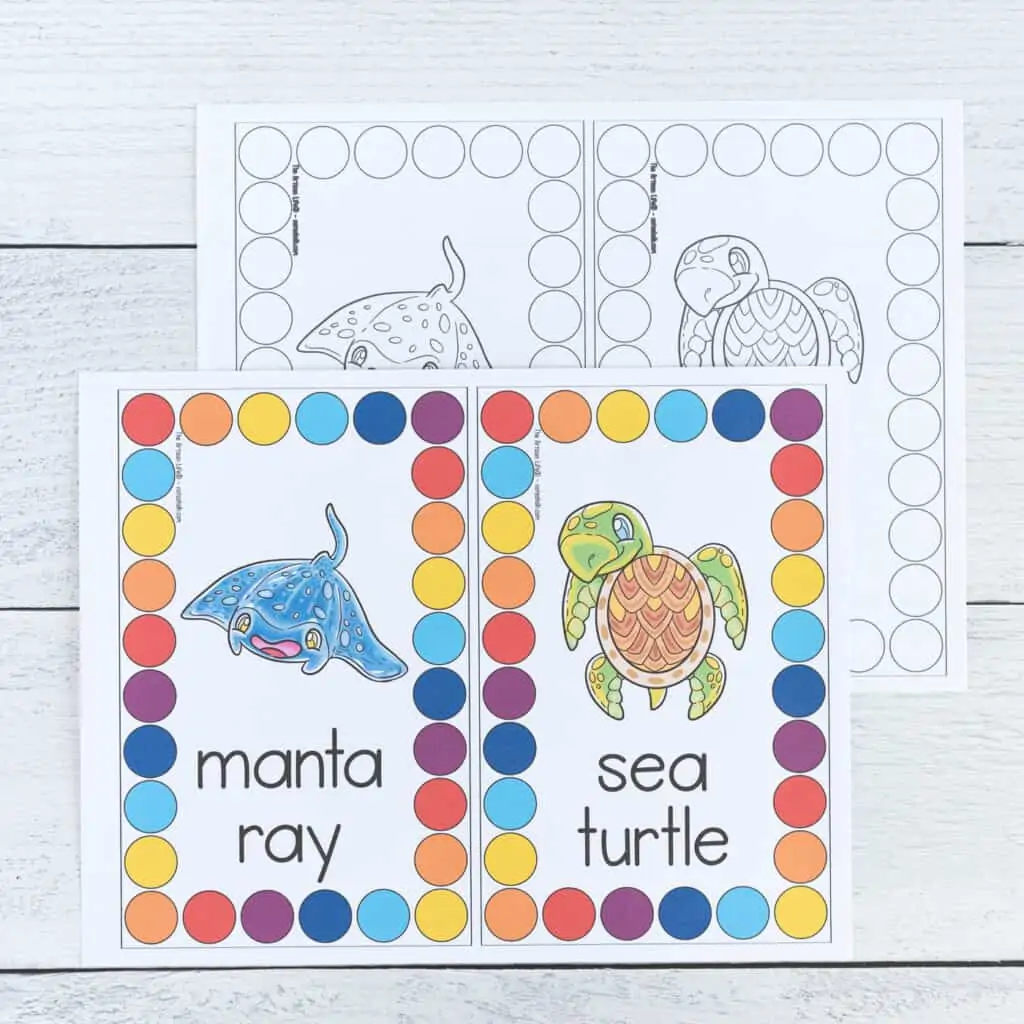 A preview of a color page and a black and white page of roll and count mats. Each page has two cards to cut apart and use. An ocean animal is in the center of each card. It is surrounded by a rectangle comprised of large circles to cover.