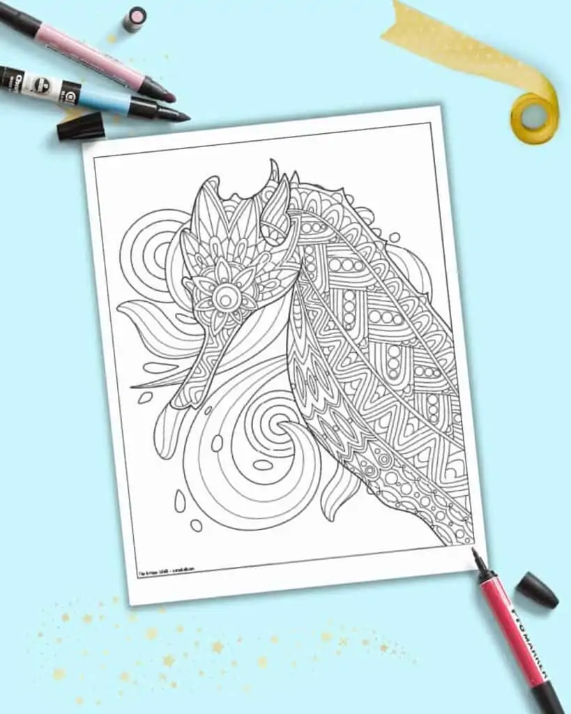 A detailed seahorse head coloring page on a light blue background with scrapbooking markers.