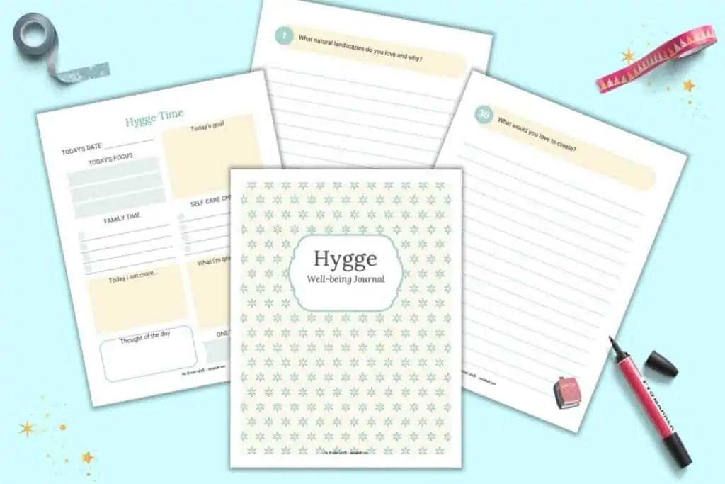 A preview of four pages of a hygge themed journal and planner. Pages include a cover page, daily planner, and two pages of journal paper with writing prompts.