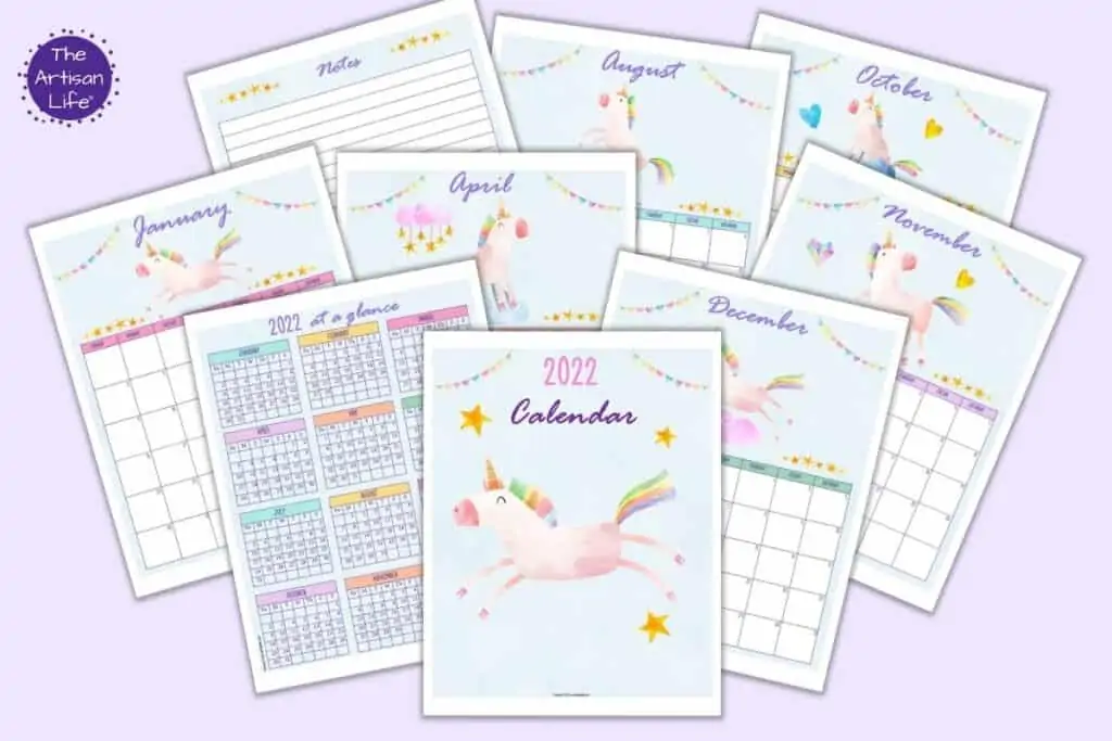 A preview of nine printable unicorn themed calendar pages for 2022. Pages include: a cover page, year at a glance, notices, vision board, and monthly dated calendar pages.