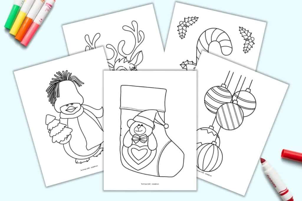 A preview of five printable easy Christmas coloring pages for children and seniors. The pages show: a Christmas stocking with a bear on it, a penguin with a Christmas tree, five ornaments, a candy cane, and a reindeer.