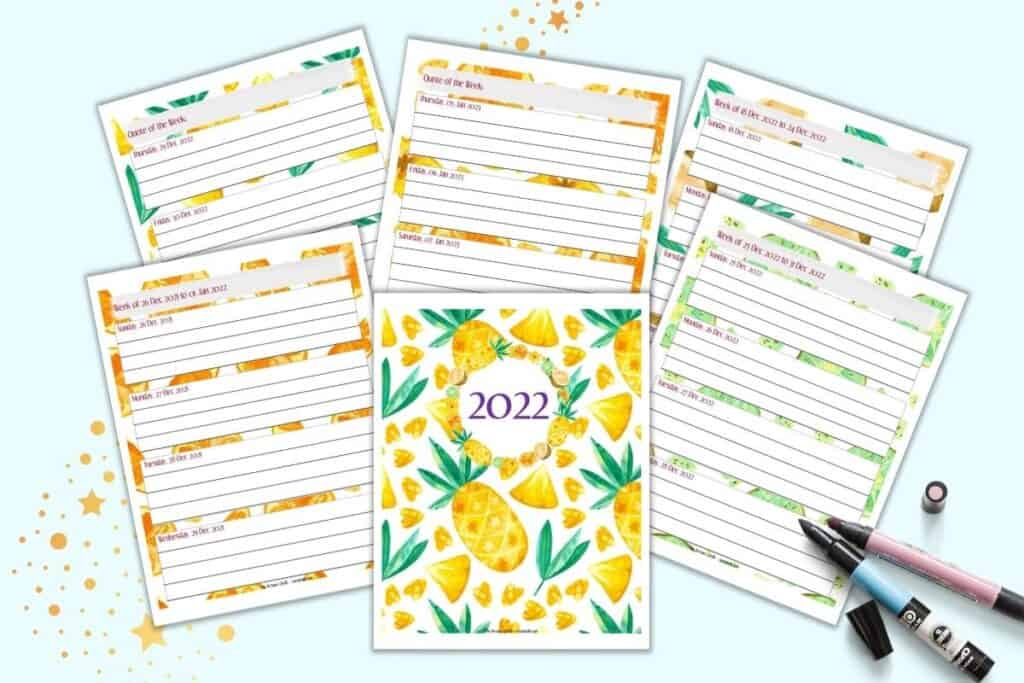A preview of six pages of weekly planner for 2022. The front and center page has pineapples and is a 2022 over page. Behind are weekly pages with either four days or three days and a space for note taking.