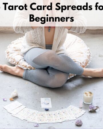 Text "5 tarot card spreads for beginners" over an image of a woman sitting in shoelace post with a spread of cards