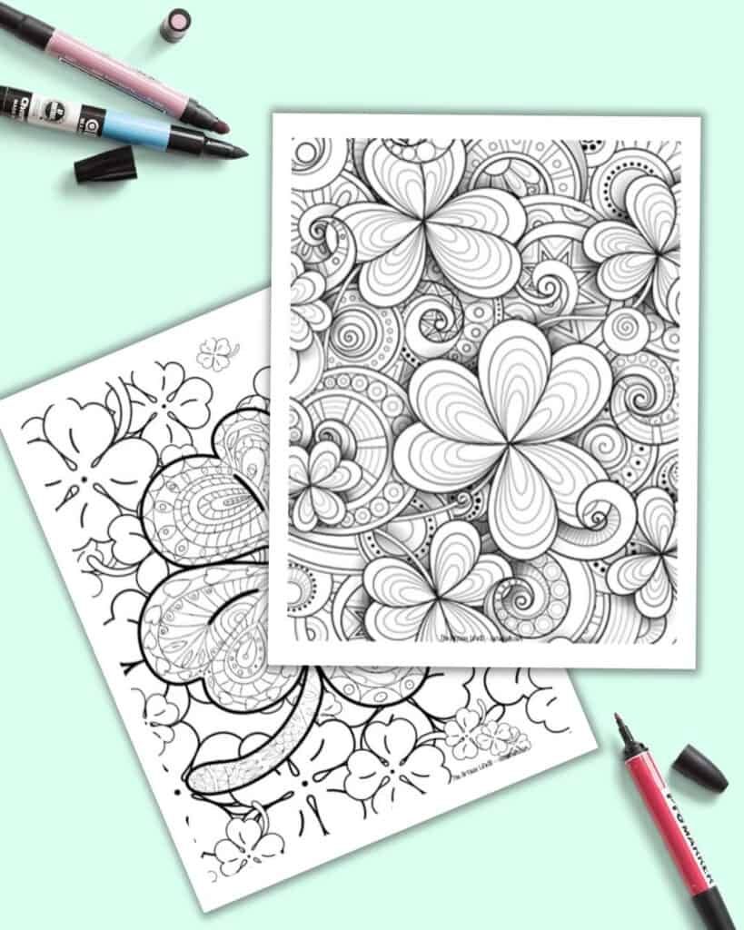 a preview of two detailed, zen-style four leaf clover coloring pages on a light green background