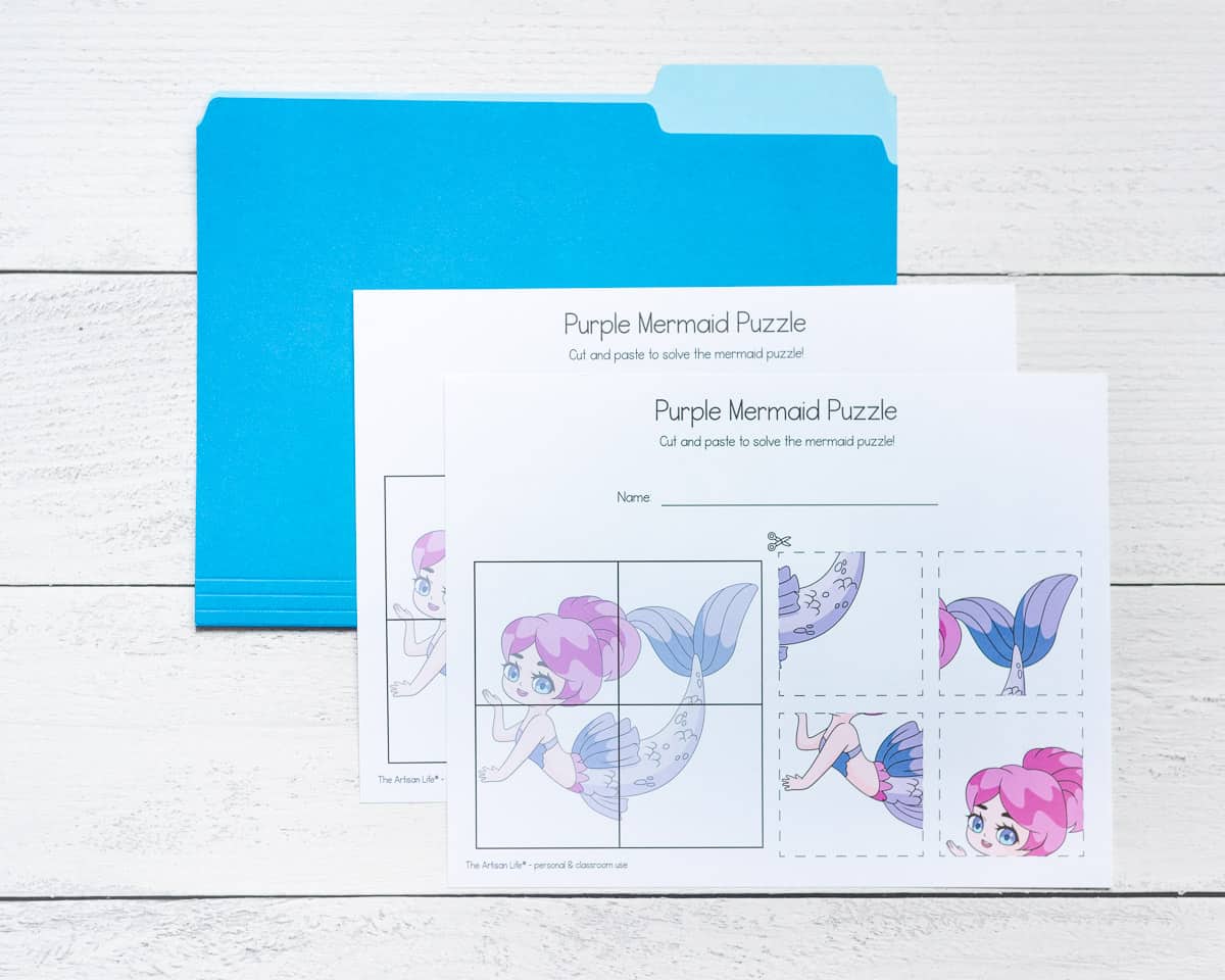 Two printed sheets of mermaid puzzle and a blue file folder