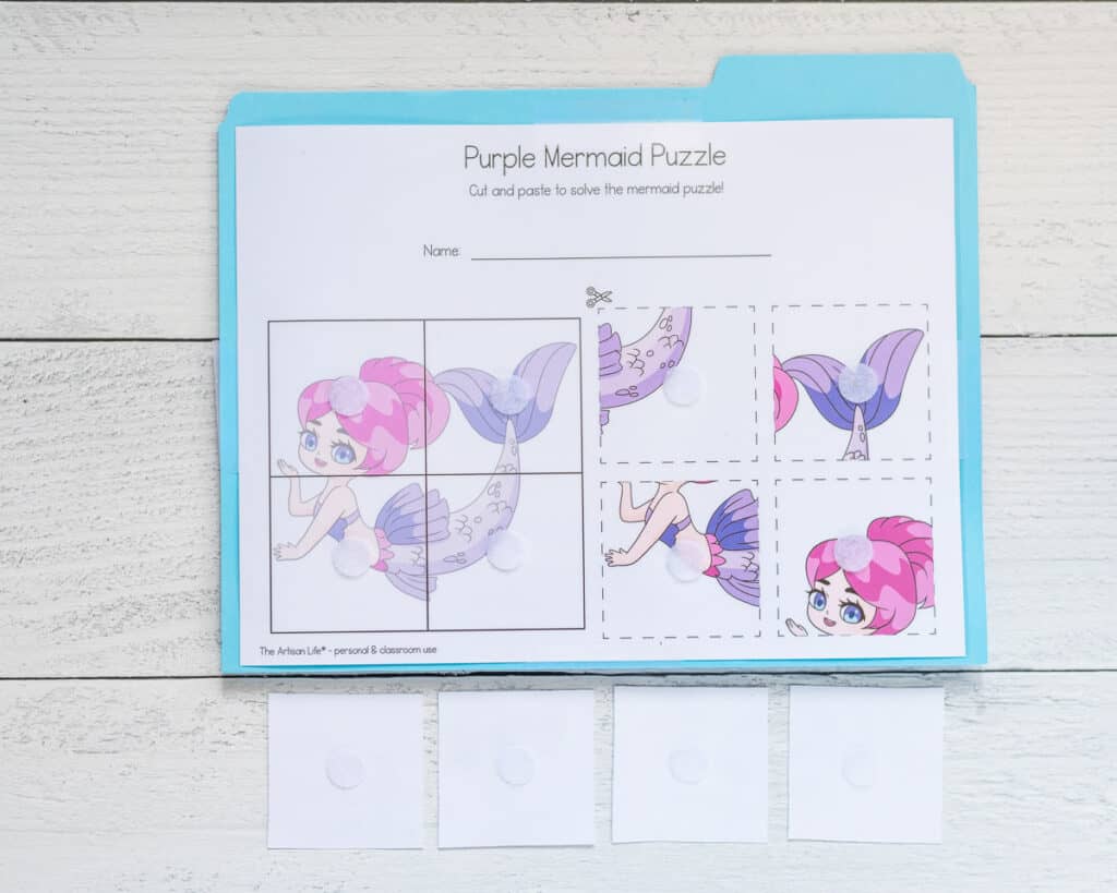 A file folder game of a four piece puzzle with a mermaid 