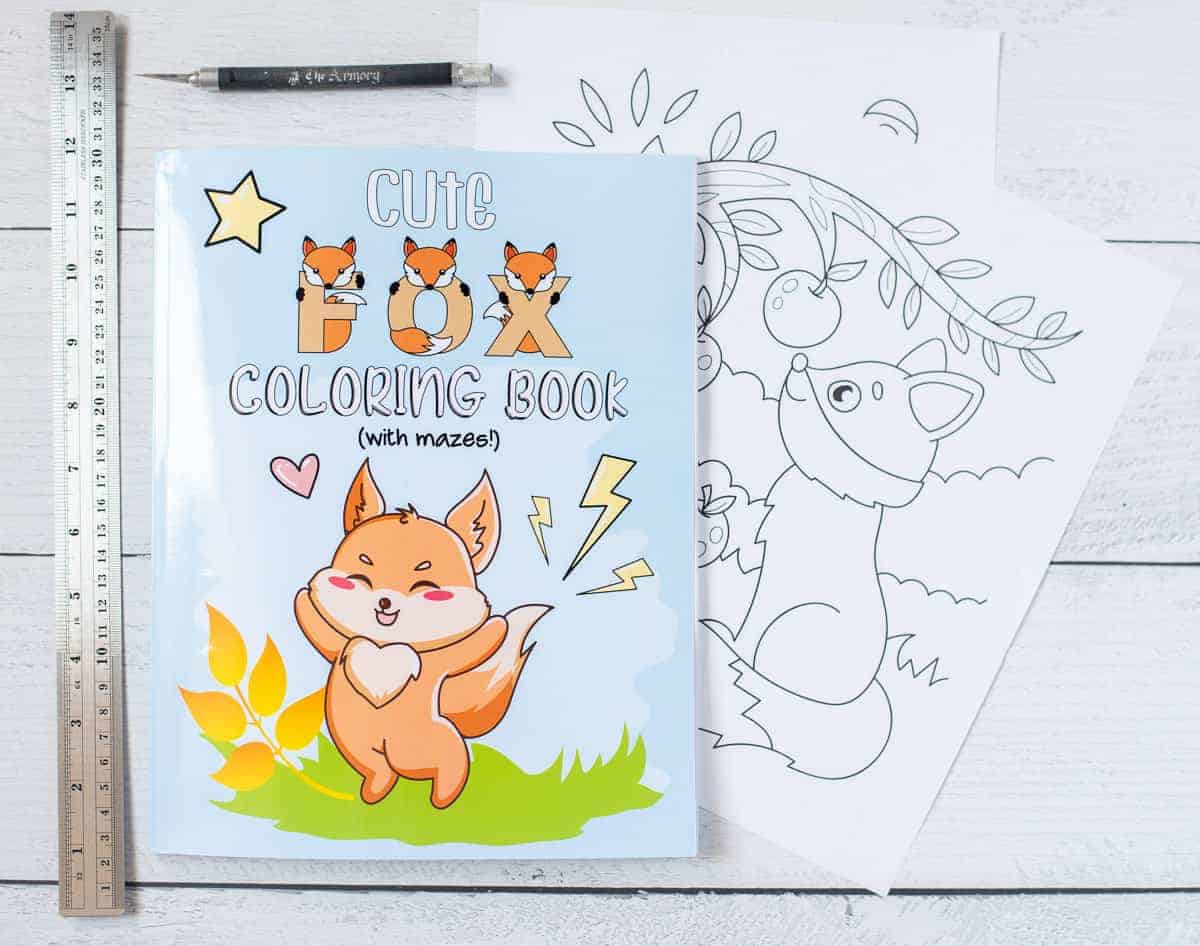 https://natashalh.com/wp-content/uploads/2022/05/cutting-a-page-from-fox-coloring-book-1.jpg