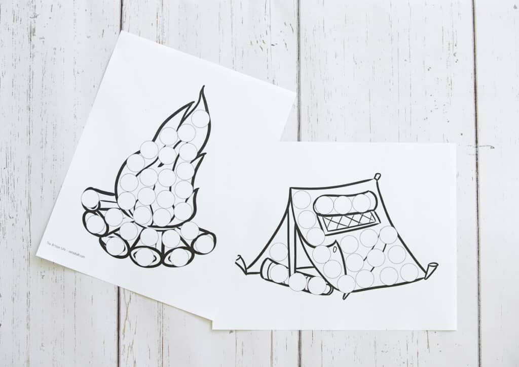 A top down photo of a camp fire and a tent dot marker coloring page