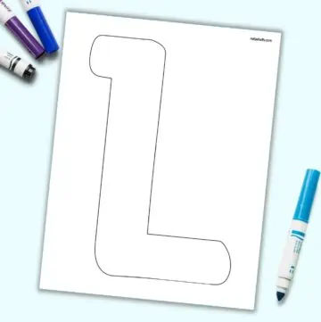 A page with a large bubble letter L. It is shown on a light blue background with colorful children's markers.