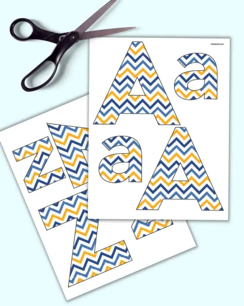 A preview of two pages of A preview of two pages of Hanukkah bulletin board letters with blue and gold stripes