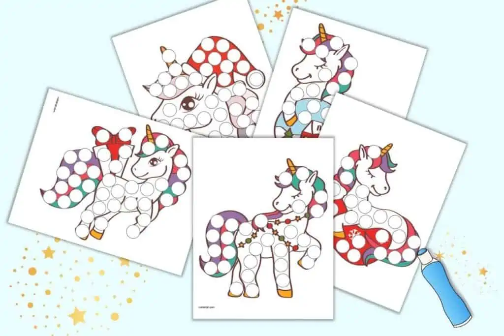A preview of five colorful Christmas themed unicorn dot marker pages. They are on a light blue background with stars and a blue marker.
