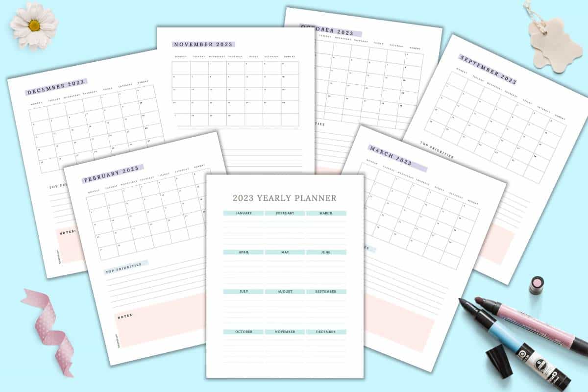 A preview of seven 2023 dated calendar pages. Pages include a ear at a glance, February, March, September, October, and November