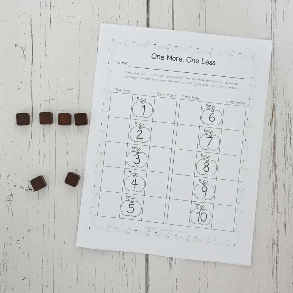 A printed one more, one less worksheet with square counting manipulatives 